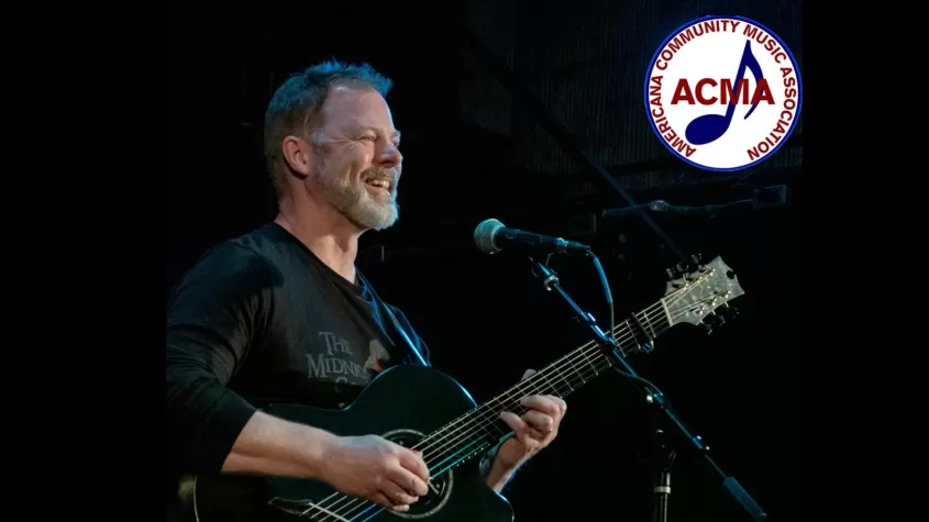 Kray Van Kirk performing; ACMA logo in corner