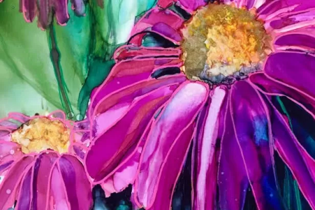 Vibrant flowers in magenta on blue and green background
